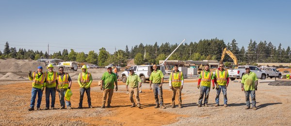EarthTech Crew Poses EarthTech Landscaping Solutions Crew posing on the construction lot for Costco Kubler Blvd Salem Photo by Lori Cegon