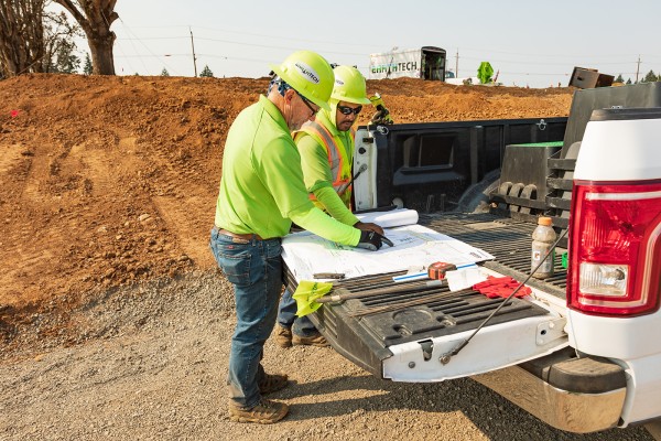 Preparing for Pipes looking at map of where to place pipes